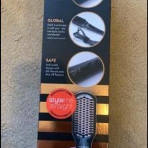 Heated styling brush